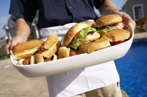 tray of hamburgers and hot dogs
